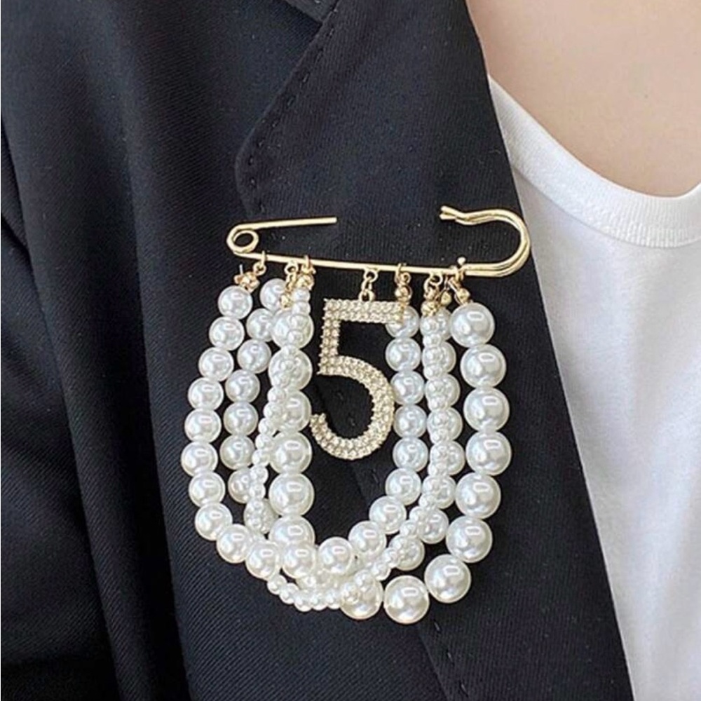 Elegant Gold and White Pearl Brooch with #5